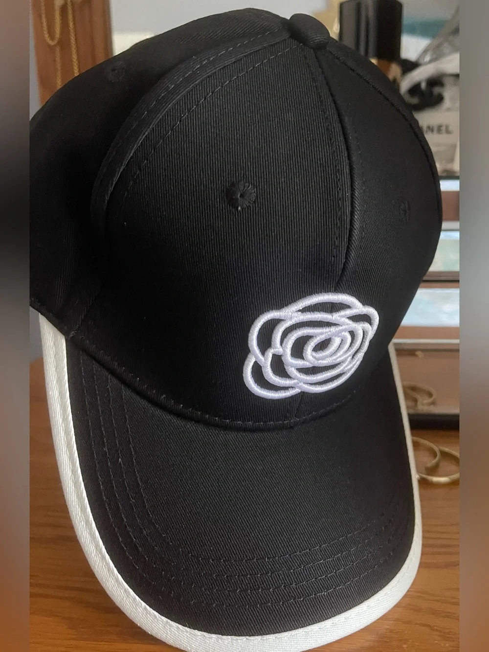 Fun Fashion New Cap Black w/white embroidered Camilla flower/Adjustable
